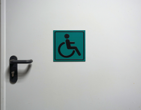 Handicap Sign on Wheelchair Accessible Porta Potty